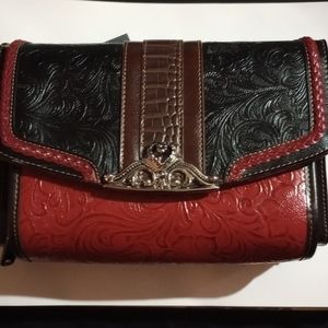 Vintage M.C. Mark Chantal western crossbody Red and black leather.